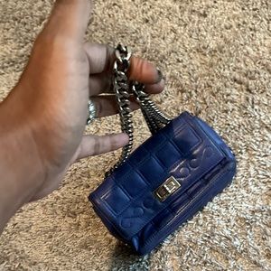 blue cross body vintage chanel min bag
